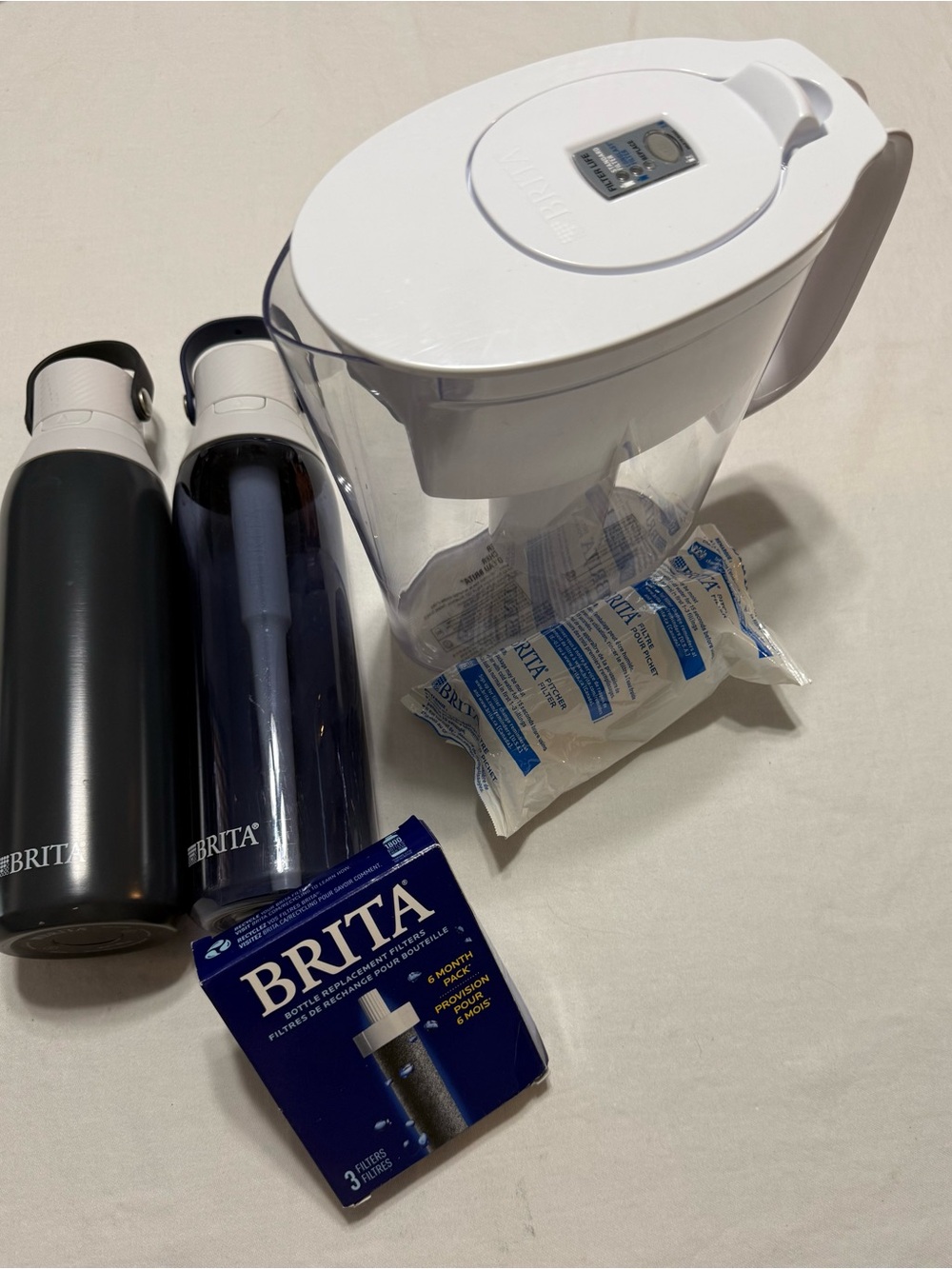 Brita Pitcher w/Filters with 2 Dark Blue Bottles & filters